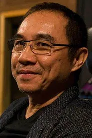 Portrait de ธเนศ วรากุลนุเคราะห์