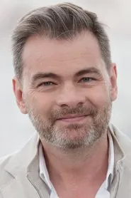 Portrait de Clovis Cornillac